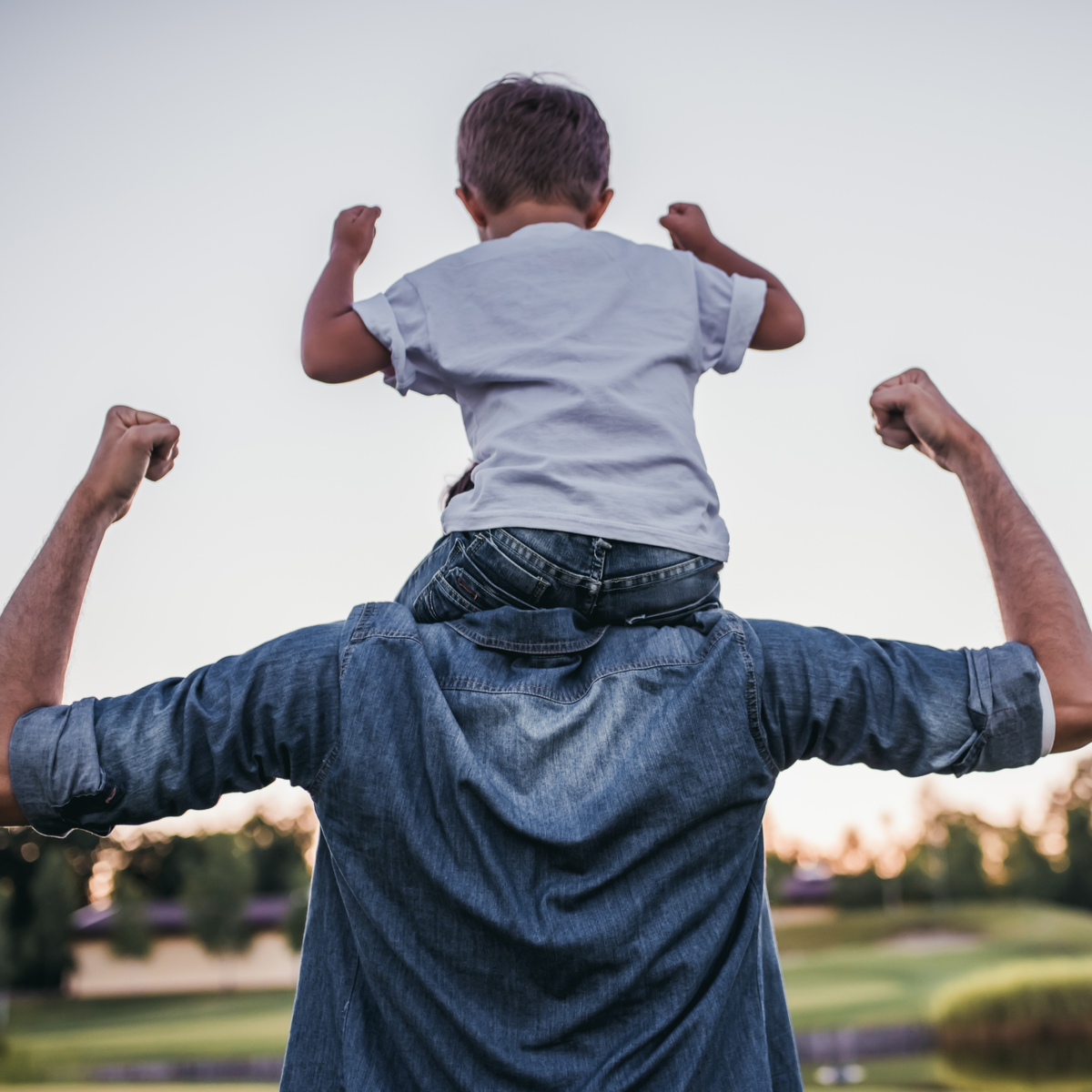 Dad and son having fun outdoors.